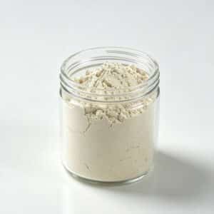 A clear glass jar filled with white powder of organic bentonite and organoclay rheological additive BT-881.
